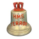 A large heavy ships bell bearing the name HMS Terror, 37cm high