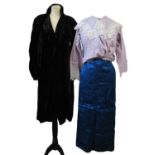 An early 20th century black velvet coat with leg-of-mutton style sleevers (later adapted), a mid