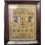 An early 19th century needlework sampler, with religious script, floral motifs and border, named '