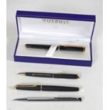 A Waterman fountain pen, having a gloss black lacquered cap and barrel, gilt pocket clip and a