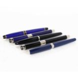 Four Waterman of Paris fountain pens, comprising an Expert in blue lacquer with gold trim; a