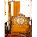 A pair of Italian floral polychrome decorated single bedsteads, each with side rails, and of