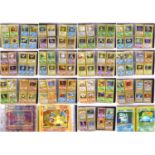 Pokemon card binder containing Wizards of the Coast era sets, to include Base Set Charizard 4/102,