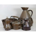 A collection of metalware, to include a copper four-gallon jug, with riveted handles, h.43cm, a