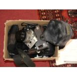 A collection of cameras, to include a Minolta 404SI camera body with macro lens, Kodak Ekton compact