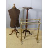 A mahogany pedestal plant stand with fluted column, h.104cm; together with a tailor's dummy, and a