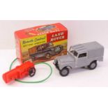 Marks Toys Remote control and battery-operated model of a Land Rover, comprising a grey body with
