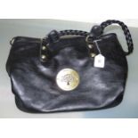 Mulberry Daria black leather hobo style handbag with laser-cut Mulberry tree logo on brass finish