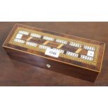 19th Century mahogany bone and chequer inlaid games box, the hinged lid with integral cribbage board
