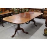 Good quality reproduction mahogany twin pedestal dining table on turned column and tripod