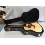 916 Type Grand Auditorium acoustic guitar, bearing an interior label and headstock decal (no visible