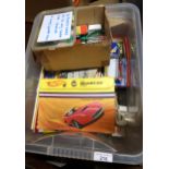 Box containing a quantity of various diecast metal model vehicles, including Majorette, some with