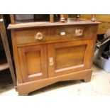 Small Arts and Crafts mahogany side cabinet, with single drawer above a cupboard door, with copper