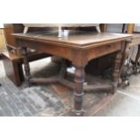Early 20th Century oak rectangular draw-leaf dining table on turned supports with cross-over