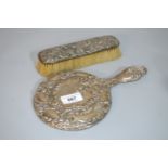 Silver mounted hand mirror and hair brush (at fault)