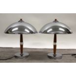 Pair of Art Deco orange Bakelite and chrome table lamps, with dome shades, 38cm diameter x 42cm high