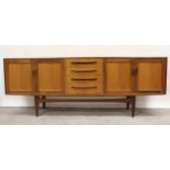G Plan mid 20th Century teak sideboard having four central drawers flanked by two panelled doors,