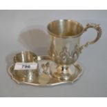 Victorian silver pedestal Christening mug, together with a small oval silver dish, napkin ring and a