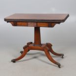 A REGENCY ROSEWOOD TEA TABLE.