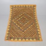 AN EARLY 20TH CENTURY INDIAN EMBROIDERED TABLE CLOTH.