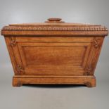 A LARGE 19TH CENTURY OAK WINE COOLER.