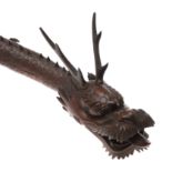 LARGE JAPANESE ARTICULATED WOODEN DRAGON.