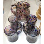 A Murano style glass pitcher, with matching tumblers, decorated in the Confetti pattern, 17cm