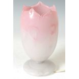 A 20th century Vasart glass lamp, of tulip form, featuring pink and white colour scheme, raised on a