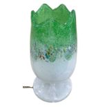 A 20th century Vasart style table lamp of tulip form decorated with green mottled patterns raised on
