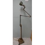 A large floor standing industrial lamp