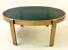 LOW TABLE WITH A GILT METAL FRAME AND SMOKED GLASS TOP.
