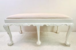 HALL SEAT WITH NEUTRAL LINEN UPHOLSTERY ON PAINTED CLAW AND BALL SUPPORTS.