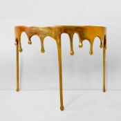 GILT METAL CONSOLE TABLE WITH DRIPPING DESIGN.