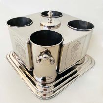 POLISHED METAL FOUR BOTTLE WINE COOLER WITH INNER RESERVOIR.