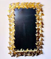 WALL MIRROR WITH GILT METAL BUTTERFLY FRAME.