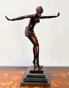 ART DECO STYLE BRONZE SCULPTURE OF A DANCER ON A STEPPED MARBLE BASE.
