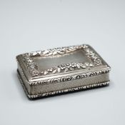 A VICTORIAN PARCEL-GILT SILVER SNUFF BOX.