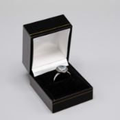 AN AQUAMARINE AND DIAMOND DRESS RING.