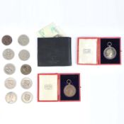 TWO ROYAL ACADEMY OF MUSIC MEDALS, A WALLET AND COMMEMORATIVE COINS. (QTY).