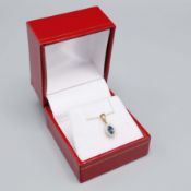 A 9CT YELLOW GOLD SAPPHIRE AND DIAMOND PENDANT NECKLACE.