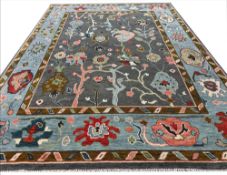 FINE CONTEMPORARY OUSHAK CARPET.