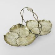 A REED AND BARTON STERLING SILVER 'LILY PAD' SERVING DISH.