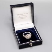 A 10CT WHITE GOLD DIAMOND CLUSTER RING.