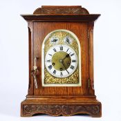 EDWARDIAN OAK MANTEL CLOCK.
