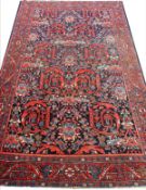 ANTIQUE PERSIAN FEREGHAN RUG.