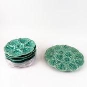 A SET OF SEVEN FRENCH MAJOLICA GIEN OYSTER PLATES. (7).