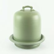 A CERAMIC CHEESE DOME IN A CELADON GLAZE.