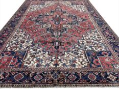 ANTIQUE PERSIAN HERIZ CARPET.