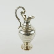 A VICTORIAN SILVER WINE EWER.