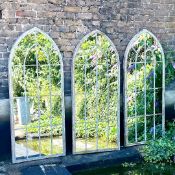 SET OF THREE ARCHITECTUAL GARDEN MIRRORS WITH ARCHED METAL FRAMES.
